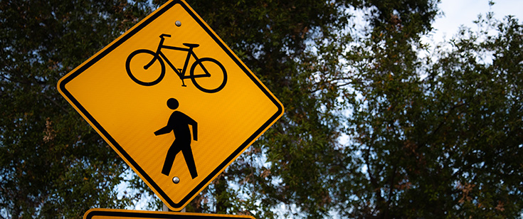 Road sign with bicycle and pedestrian symbols. Road sign with bicycle and pedestrian symbols.